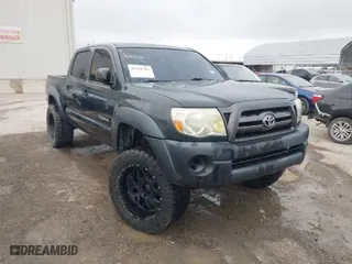 2009 Toyota Tacoma with VIN 3TMLU42N89M032318, listed as a IAAI auction lot 41990701 with 248,947 mi miles. Bid and sale history available at carsss.com. Image 1.