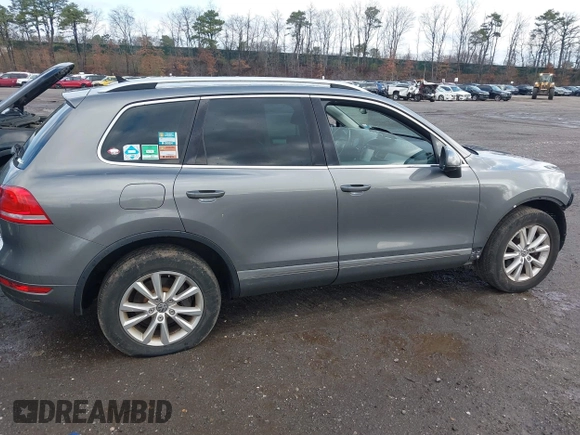 2013 Volkswagen Touareg Lux with VIN WVGEF9BPXDD000679, listed as a IAAI auction lot 41956471 with 117,465 mi miles and . Bid and sale history available at DreamBid. Image 13.