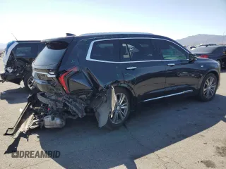 2020 Cadillac XT6 FWD Premium Luxury z VIN 1GYKPCRS9LZ126510, wystawiony jako Copart lot #58240585 z przebiegiem 57 156 mil mil oraz Szkoda całkowita • Salvage title. Historia ofert i sprzedaży dostępna na DreamBid. Obrazek 3.