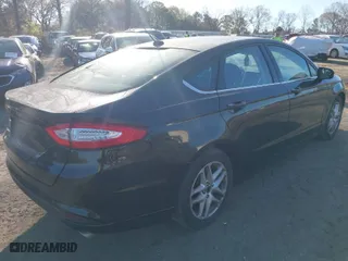 2014 Ford Fusion SE with VIN 3FA6P0H71ER178889, listed as a IAAI auction lot 41883131 with 236,447 mi miles. Bid and sale history available at carsss.com. Image 4.
