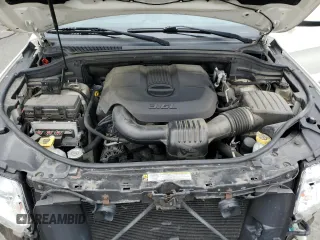 2011 Jeep Grand Cherokee Laredo with VIN 1J4RR4GG9BC515467, listed as a Copart auction lot 58411085 with 112,558 mi miles and Salvage title. Bid and sale history available at DreamBid. Image 12.