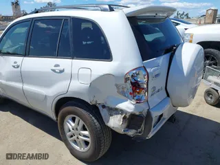 2003 Toyota RAV4 with VIN JTEGH20V530087358, listed as a IAAI auction lot 41946177 with 232,628 mi miles. Bid and sale history available at carsss.com. Image 6.