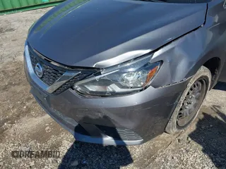 2018 Nissan Sentra S with VIN 3N1AB7AP7JY285793, listed as a IAAI auction lot 41865969 with 140,719 mi miles and . Bid and sale history available at DreamBid. Image 6.