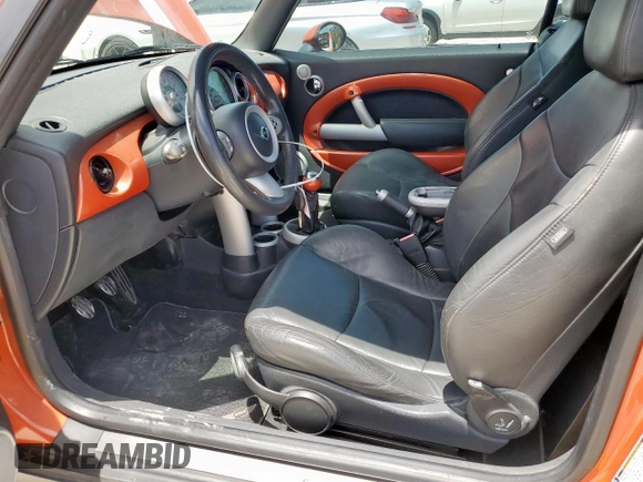 2007 MINI Convertible S with VIN WMWRH33547TJ43144, listed as a Copart auction lot 65440545 with 88,073 mi miles and Salvage title. Bid and sale history available at DreamBid. Image 7.