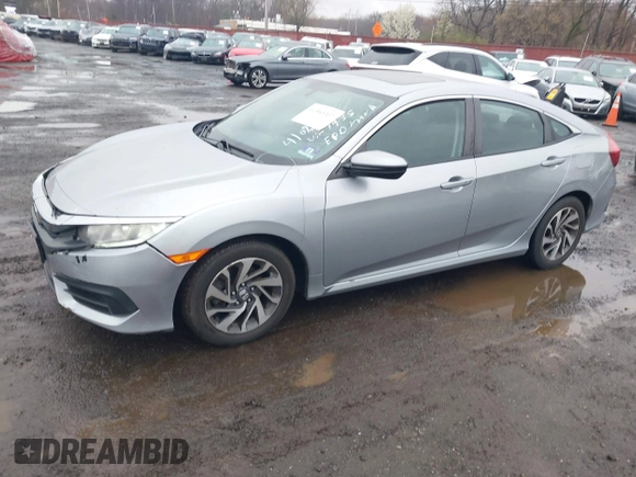 2016 Honda Civic EX with VIN 19XFC2F75GE217935, listed as a IAAI auction lot 41963307 with 87,477 mi miles and . Bid and sale history available at DreamBid. Image 17.