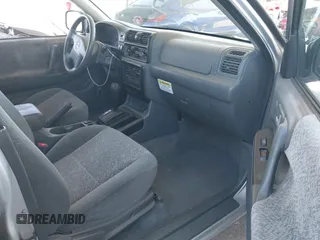 2001 Isuzu Rodeo S with VIN 4S2CK58W614361048, listed as a IAAI auction lot 41681566 with 133,460 mi miles and . Bid and sale history available at DreamBid. Image 5.