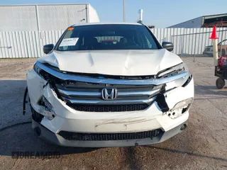 2016 Honda Pilot LX with VIN 5FNYF5H13GB016698, listed as a IAAI auction lot 41685173 with 188,001 mi miles and . Bid and sale history available at DreamBid. Image 13.