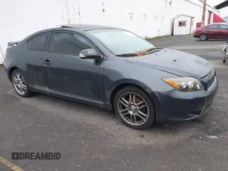 2010 Scion tC with VIN JTKDE3B75A0314185, listed as a IAAI auction lot 41369224 with 164,244 mi miles. Bid and sale history available at carsss.com. Image 1.