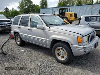 1998 Jeep Grand Cherokee Limited с VIN 1J4GZ78Y0WC245194, выставлен на аукционе Copart как лот 57838825 с пробегом 199 412 миль миль и Списание • Salvage title. История ставок и продаж доступна на DreamBid. Изображение 4.
