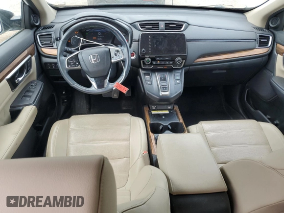 2020 Honda CR-V Touring z VIN 7FART6H9XLE020917, wystawiony jako Copart lot #58069125 z przebiegiem 63 535 mil mil oraz Czysty tytuł • Clean title. Historia ofert i sprzedaży dostępna na DreamBid. Obrazek 8.