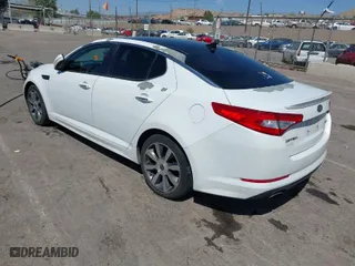 2012 Kia Optima SX with VIN 5XXGR4A63CG050800, listed as a IAAI auction lot 42051920 with 159,941 mi miles. Bid and sale history available at carsss.com. Image 3.
