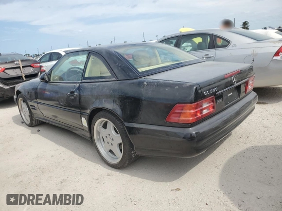 1999 Mercedes-Benz SL-Class with VIN WDBFA68F0XF177818, listed as a Copart auction lot 75025494 with 0 mi miles and Salvage Title. Bid and sale history available at carsss.com. Image 2.