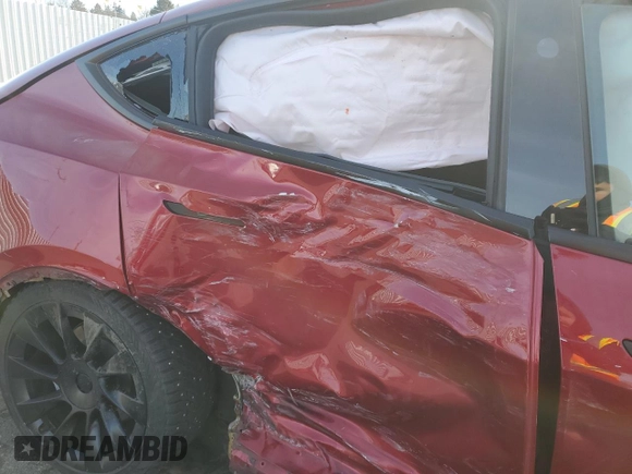 2024 Tesla Model Y Long Range with VIN 7SAYGAEEXRF056411, listed as a Copart auction lot 89218715 with Not Provided miles and Salvage Title. Bid and sale history available at DreamBid. Image 10.