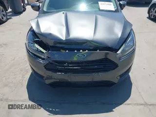 2018 Ford Focus SE with VIN 1FADP3FE3JL204220, listed as a IAAI auction lot 41972960 with 62,682 mi miles and . Bid and sale history available at DreamBid. Image 17.