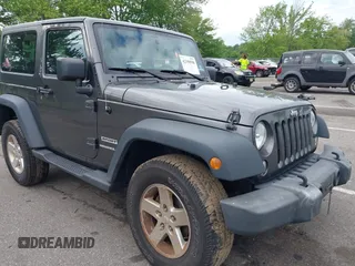 2016 Jeep Wrangler Willys Wheeler with VIN 1C4GJWAG2GL318981, listed as a IAAI auction lot 42390588 with 131,559 mi miles and . Bid and sale history available at DreamBid. Image 1.