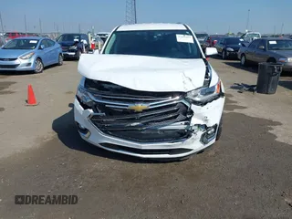 2018 Chevrolet Traverse Premier z VIN 1GNERKKW6JJ220965, wystawiony jako IAAI lot #37625637 z przebiegiem 99 072 mil mil oraz . Historia ofert i sprzedaży dostępna na DreamBid. Obrazek 13.