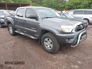 2013 Toyota Tacoma z VIN 5TFLU4EN0DX077171, wystawiony jako IAAI lot #42248057 z przebiegiem 250 193 mil mil oraz . Historia ofert i sprzedaży dostępna na DreamBid. Obrazek 1.