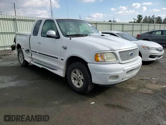 2002 Ford F-150 XL z VIN 2FTRX08L12CA26636, wystawiony jako Copart lot #89254825 z przebiegiem 133 637 mil mil oraz Szkoda całkowita • Salvage title. Historia ofert i sprzedaży dostępna na DreamBid. Obrazek 11.
