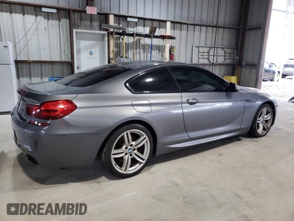 2015 BMW 6 Series 650i xDrive z VIN WBAYM1C53FD325311, wystawiony jako Copart lot #59563355 z przebiegiem 157 675 mil mil oraz Czysty tytuł • Clean title. Historia ofert i sprzedaży dostępna na DreamBid. Obrazek 3.