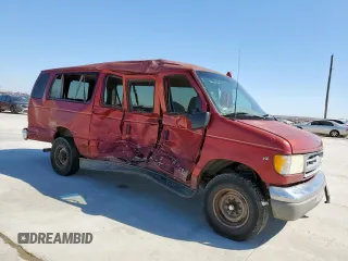 2001 Ford Econoline Passenger XL with VIN 1FBSS31L21HA40360, listed as a Copart auction lot 46909575 with 317,780 mi miles and Salvage title. Bid and sale history available at DreamBid. Image 4.
