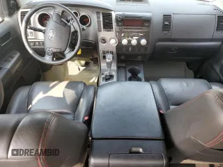 2012 Toyota Tundra with VIN 5TFUW5F10CX213930, listed as a Copart auction lot 60213445 with 147,371 mi miles and Salvage title. Bid and sale history available at DreamBid. Image 8.