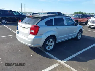 2011 Dodge Caliber Mainstreet with VIN 1B3CB3HA2BD117839, listed as a IAAI auction lot 42101103 with 142,099 mi miles. Bid and sale history available at carsss.com. Image 4.
