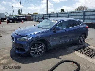 2018 BMW X2 sDrive28i with VIN WBXYJ3C39JEJ75183, listed as a Copart auction lot 52098295 with 70,280 mi miles and Salvage Title. Bid and sale history available at carsss.com. Image 1.