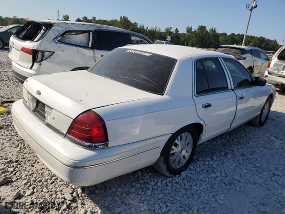 2004 Ford Crown Victoria LX with VIN 2FDFP74W34X164453, listed as a Copart auction lot 75922204 with 103,546 mi miles and Salvage Title. Bid and sale history available at carsss.com. Image 3.