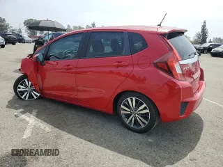 2015 Honda Fit EX-L with VIN 3HGGK5H87FM701108, listed as a Copart auction lot 55536945 with 57,519 mi miles and Salvage title. Bid and sale history available at DreamBid. Image 2.
