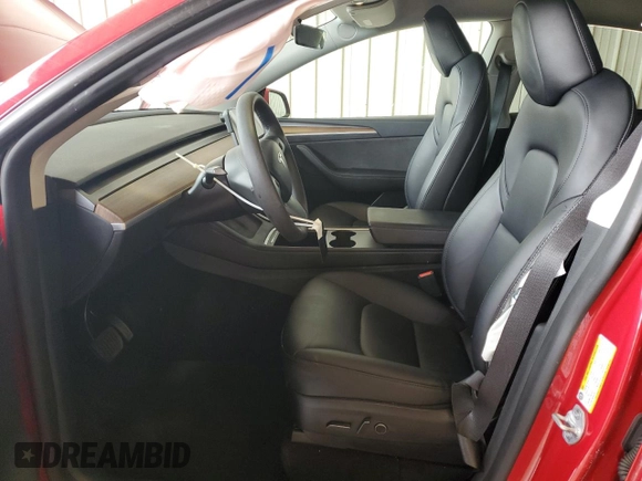 2023 Tesla Model Y Long Range z VIN 7SAYGAEE8PF701618, wystawiony jako Copart lot #57573875 z przebiegiem 39 463 mil mil oraz Szkoda całkowita • Salvage title. Historia ofert i sprzedaży dostępna na DreamBid. Obrazek 7.
