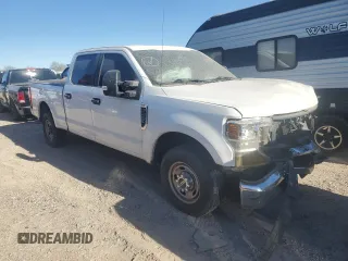 2020 Ford F-250 XL with VIN 1FT7W2A64LEC12385, listed as a Copart auction lot 77958334 with 122,635 mi miles and Salvage title. Bid and sale history available at DreamBid. Image 4.