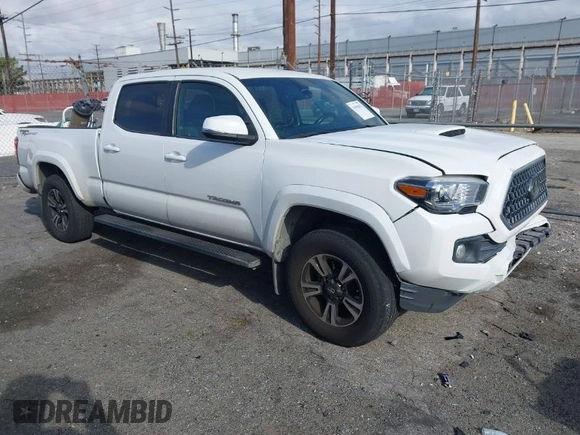 2018 Toyota Tacoma SR5 with VIN 3TMBZ5DN7JM016650, listed as a IAAI auction lot 41903835 with 105,123 mi miles and . Bid and sale history available at DreamBid. Image 1.