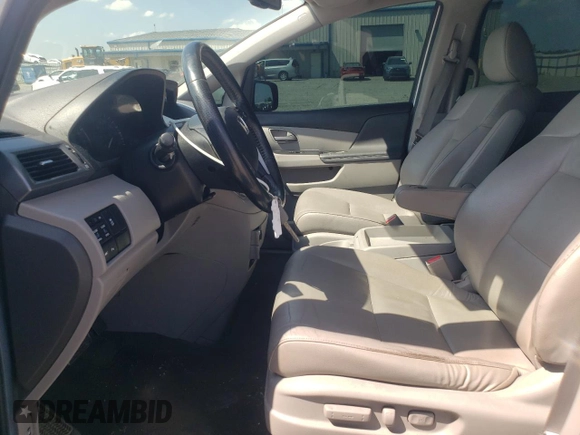 2012 Honda Odyssey Touring with VIN 5FNRL5H94CB009952, listed as a Copart auction lot 54322695 with 135,551 mi miles and Salvage title. Bid and sale history available at DreamBid. Image 7.