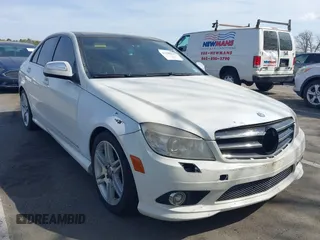 2009 Mercedes-Benz C-Class 3.5L Sport with VIN WDDGF56X69R055050, listed as a IAAI auction lot 42105231 with 146,186 mi miles. Bid and sale history available at carsss.com. Image 1.