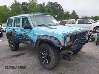 1997 Jeep Cherokee SE z VIN 1J4FJ28S3VL573144, wystawiony jako IAAI lot #41965201 z przebiegiem 298 276 mil mil oraz . Historia ofert i sprzedaży dostępna na DreamBid. Obrazek 1.