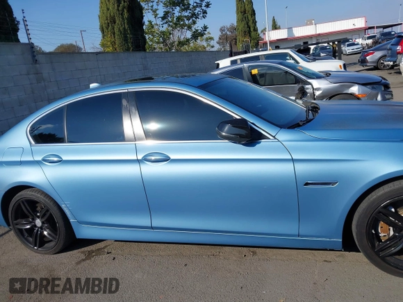 2015 BMW 5 Series 535i with VIN WBA5B1C50FD920397, listed as a IAAI auction lot 41459879 with 172,259 mi miles and . Bid and sale history available at carsss.com. Image 13.