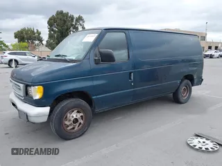 1998 Ford Econoline Cargo with VIN 1FTRE1426WHB06957, listed as a IAAI auction lot 42071927 with 99,999 mi miles. Bid and sale history available at carsss.com. Image 2.