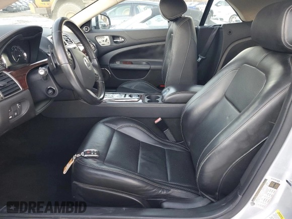 2010 Jaguar XK with VIN SAJWA4GB7ALB35518, listed as a Copart auction lot 86475814 with 32,910 mi miles and Salvage Title. Bid and sale history available at carsss.com. Image 7.