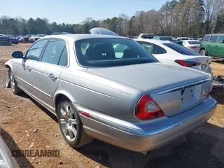 2004 Jaguar XJ with VIN SAJEA71C94SG01362, listed as a IAAI auction lot 41829470 with 172,545 mi miles. Bid and sale history available at carsss.com. Image 3.