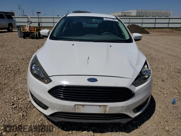 2018 Ford Focus SE with VIN 1FADP3FE0JL227146, listed as a Copart auction lot 56151985 with 124,517 mi miles and Salvage title. Bid and sale history available at DreamBid. Image 5.