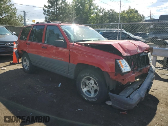 1996 Jeep Grand Cherokee Laredo with VIN 1J4GZ58S0TC170623, listed as a Copart auction lot 68019014 with 174,192 mi miles and Salvage Title. Bid and sale history available at carsss.com. Image 4.