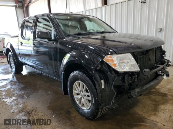 2018 Nissan Frontier SV with VIN 1N6AD0FVXJN702033, listed as a Copart auction lot 63436595 with 64,231 mi miles and Salvage title. Bid and sale history available at DreamBid. Image 4.