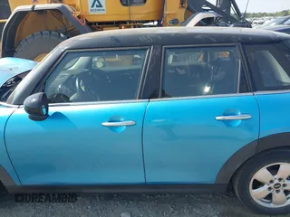 2015 MINI Hardtop 4 Door with VIN WMWXS5C56FT831505, listed as a IAAI auction lot 42155398 with 95,693 mi miles and . Bid and sale history available at DreamBid. Image 14.