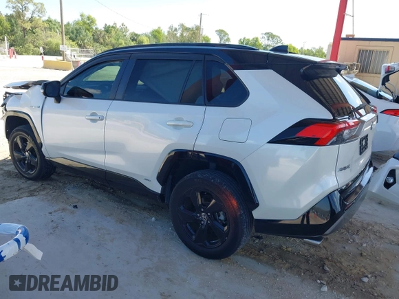2021 Toyota RAV4 Hybrid XSE with VIN 2T3E6RFV9MW019837, listed as a IAAI auction lot 42002574 with 74,214 mi miles. Bid and sale history available at carsss.com. Image 15.