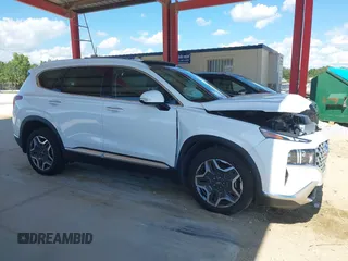 2023 Hyundai Santa Fe Limited z VIN 5NMS4DAL8PH655580, wystawiony jako IAAI lot #42267740 z przebiegiem 10 170 mil mil oraz . Historia ofert i sprzedaży dostępna na DreamBid. Obrazek 13.
