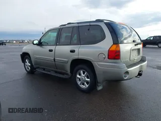 2003 GMC Envoy SLT with VIN 1GKDT13S532308502, listed as a IAAI auction lot 41676188 with 218,626 mi miles. Bid and sale history available at carsss.com. Image 14.