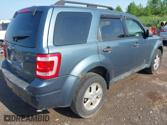 2011 Ford Escape XLS with VIN 1FMCU0C78BKA78085, listed as a IAAI auction lot 42556934 with 118,017 mi miles and . Bid and sale history available at DreamBid. Image 4.