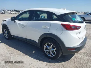 2016 Mazda CX-3 Touring with VIN JM1DKBC71G0126040, listed as a IAAI auction lot 41860285 with 97,986 mi miles and . Bid and sale history available at DreamBid. Image 3.