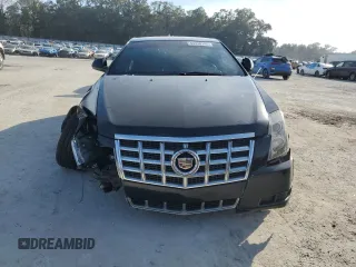 2012 Cadillac CTS z VIN 1G6DA1E30C0106642, wystawiony jako Copart lot #43330145 z przebiegiem 101 063 mil mil oraz Szkoda całkowita • Salvage title. Historia ofert i sprzedaży dostępna na DreamBid. Obrazek 5.