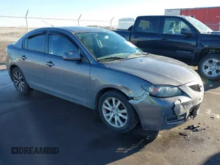 2007 Mazda 3 i Touring with VIN JM1BK32F471662609, listed as a IAAI auction lot 41658970 with 132,786 mi miles and . Bid and sale history available at DreamBid. Image 1.